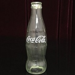 bottiglia sparizione coca cola vuota